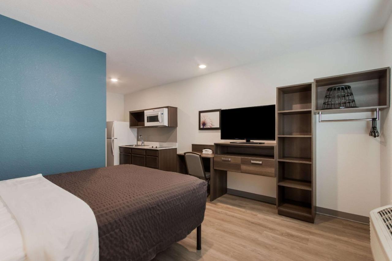 Woodspring Suites Тамарак Экстерьер фото